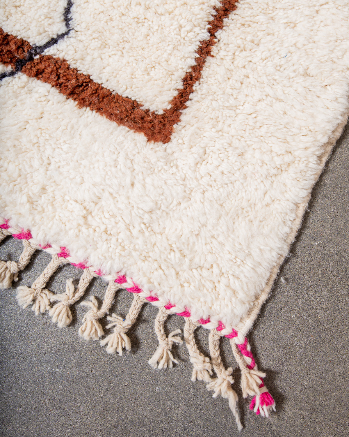 Modern, designer, handcrafted Berber rug from Morocco. Beniourain carpet with beautiful colours and patterns and fluffy wool texture.